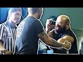 CREEP GOES ON STAGE DURING ARM WRESTLING COMPETITION