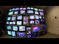 stapel tv huge wall with vintage crt tv's. Perfectly aligned to form one big picture.