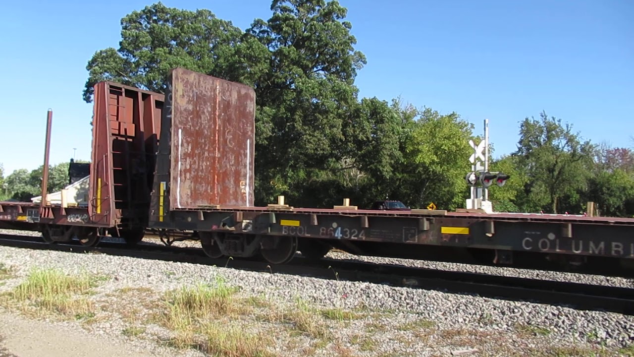 CN 2118 pulling freight cars out of the siding at Pavilion, MI for the