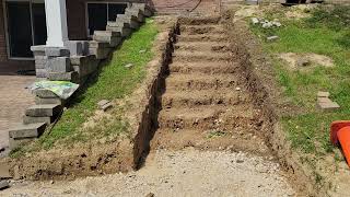 Early stages of a new staircase and retaining wall.