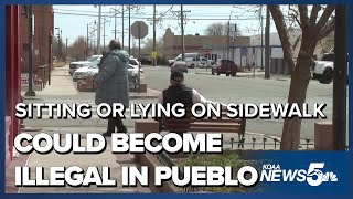 Sitting or lying on a sidewalk in Downtown Pueblo could become illegal