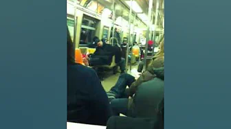 Sleeping guy with no shoes R train