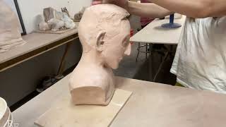 Glazing A Ceramic Bust By Pouring Glaze