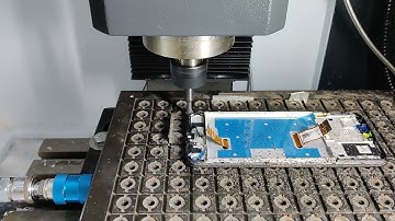 Customer use Yornew MX220 Small CNC Milling Machine cutting touch screen for smartphone industry.