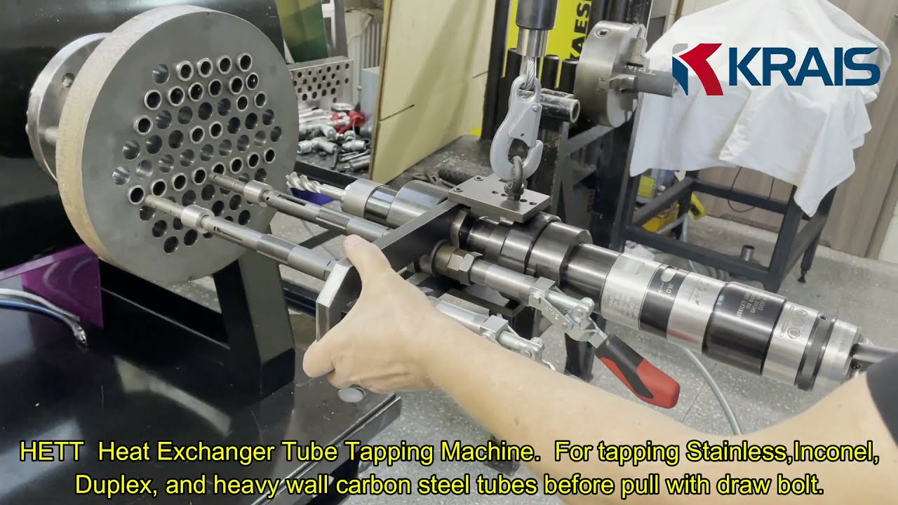 HETT  Heat Exchanger Tube Tapping Machine.