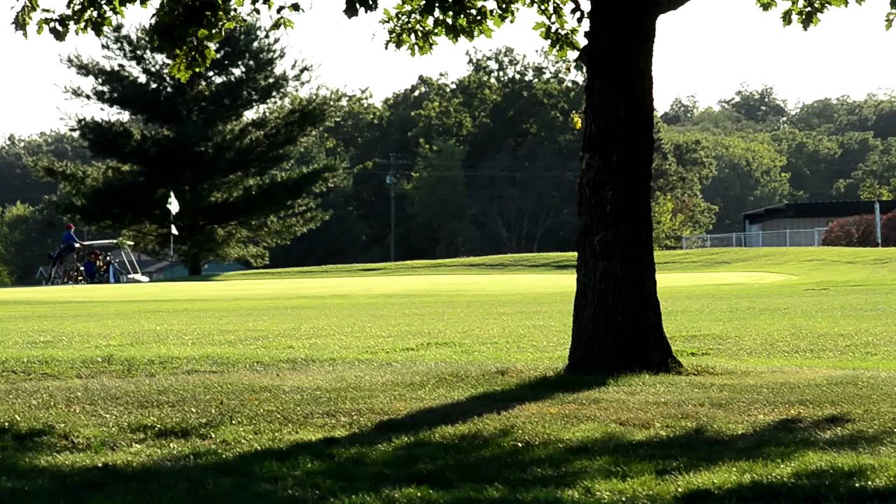 Carlinville's Eric Pingolt hits an iron shot on the ninth hole at the Carlinville Country Club