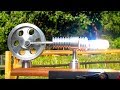 STIRLING ENGINE FRESNEL Lens on a Steek Solar powered Stirling Engine