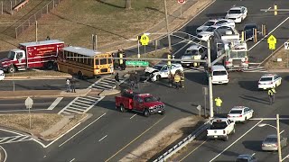 School bus, police car collide near scene of multi-vehicle crash