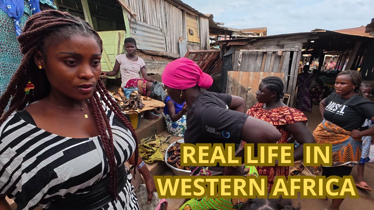 Inside african market with the cutest guide ever