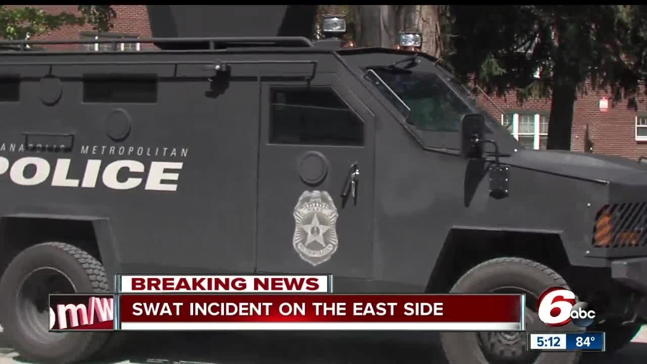 IMPD SWAT called after man barricaded inside home - YouTube