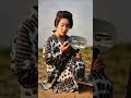 団扇を持つ女性の戦前絵葉書をAI処理