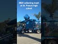 8821 collecting trash at St. Francis high school 