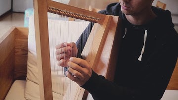 "morning coffee" played on a cardboard harp