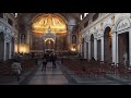 Nun playing organ in a church in Rome