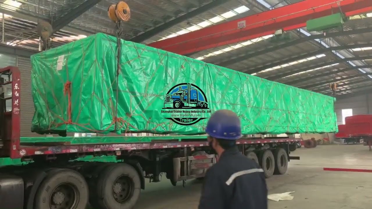 Packaging of container flatbed trailers before shipment; export of container flatbed trailers.