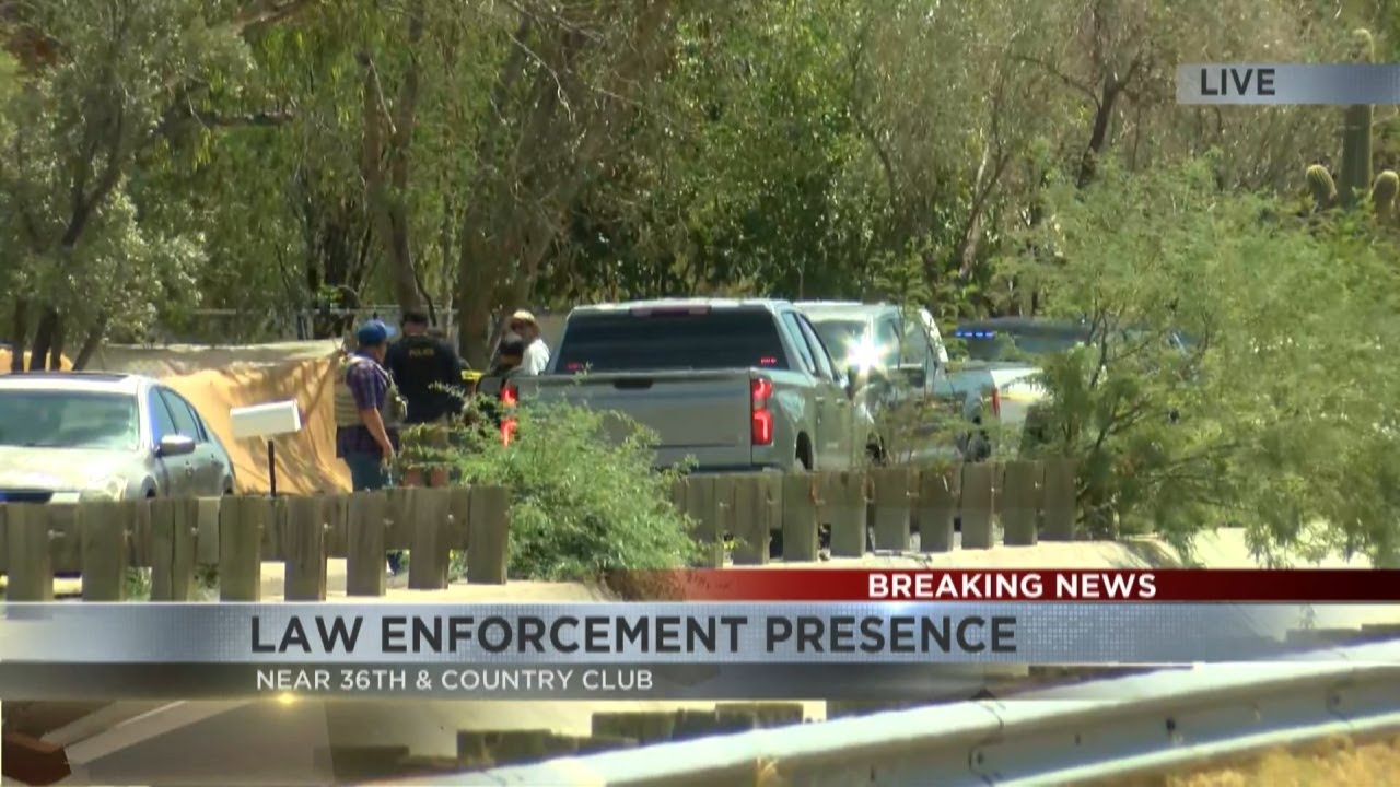 Large enforcement presence near 36th and Country Club - YouTube