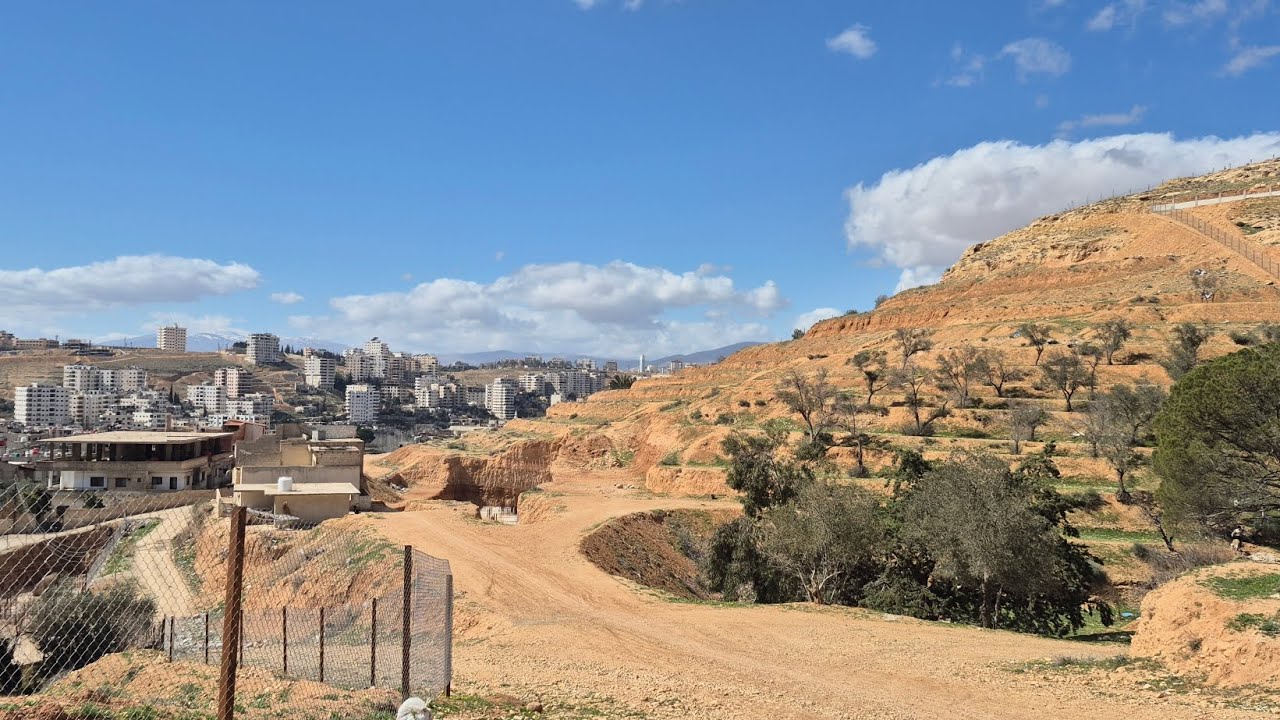 محضر للبيع ارض مساحة  1 دونم مرخصة لبناء 9 طوابق ( الهامة) 