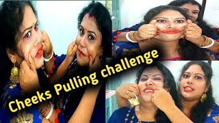 Cheeks Pulling Challenge With Partner