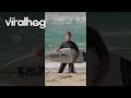Surfer Falls and Breaks His Board || ViralHog
