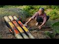 Ref:CDtrijyZ8Zk Use large bamboo to cook delicious food                               