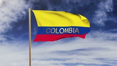 4K Colombia flag with title waving in the wind. Looping sun rises style. Animation loop Stock video