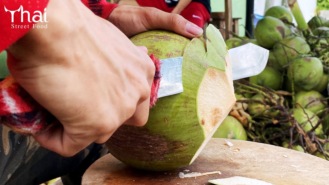 Amazing Coconut Cutting Skills How to peel a fresh coconut Thai