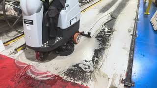 Lavor XS-R1 Ride On Scrubber Dryer Cleaning Heavy Tyre Marks on Industrial Floors