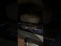 Cooking flavoured American barbecue chicken thighs in a pizza oven part 2
