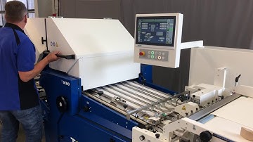 MBO T800.1 Automated Buckle Folder running a common sig at the MBO Open House for a packed crowd