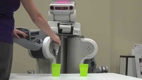 RoboFlow: A Flow-based Visual Programming Language for Mobile Manipulation Tasks