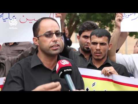 موظفو الرقابة المالية في الديوانية يحتجون ضد قانون سلم الرواتب ويهددون بالاعتصام