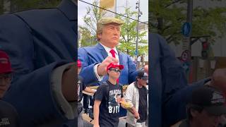 Donald Trump parade in Japan. MAGA supporters in Japanese city of Osaka with giant Trump effigy.
