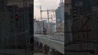 JR京都線上淀川橋梁　関空特急はるかと321系普通列車