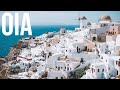 Walking in Oia, the most beautiful picturesque village in Santorini island