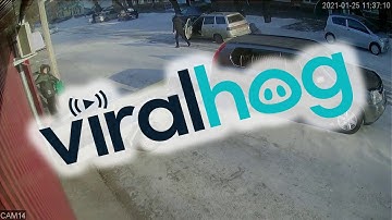 Man Hauling Trailer Loses Control Around Icy Corner || ViralHog