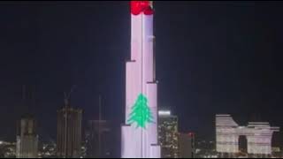 بالفيديو- العلم اللبناني يضيء سماء الإمارات من برج خليفة