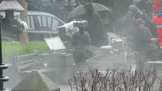 Candice Patton tries to stay warm on a frigid rainy Vancouver day on the set of The Flash for ep 416