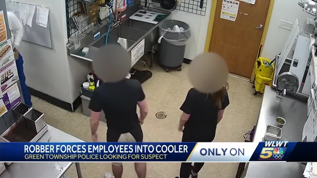 newspaper mockup Robber forces employees into cooler in Green Township