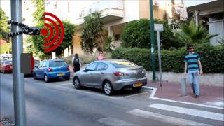 Crossing the Road Without Traffic Lights: An Android-based Safety Device