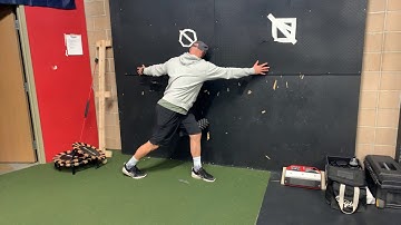 Split Stance T-Spine Rotation on Wall