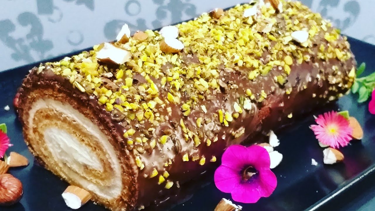 Rotolo soffice al cioccolato e crema di mascarpone😋Very soft chocolate roll with mascarpone cream