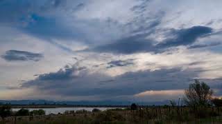 Fast-Moving Clouds Over the River