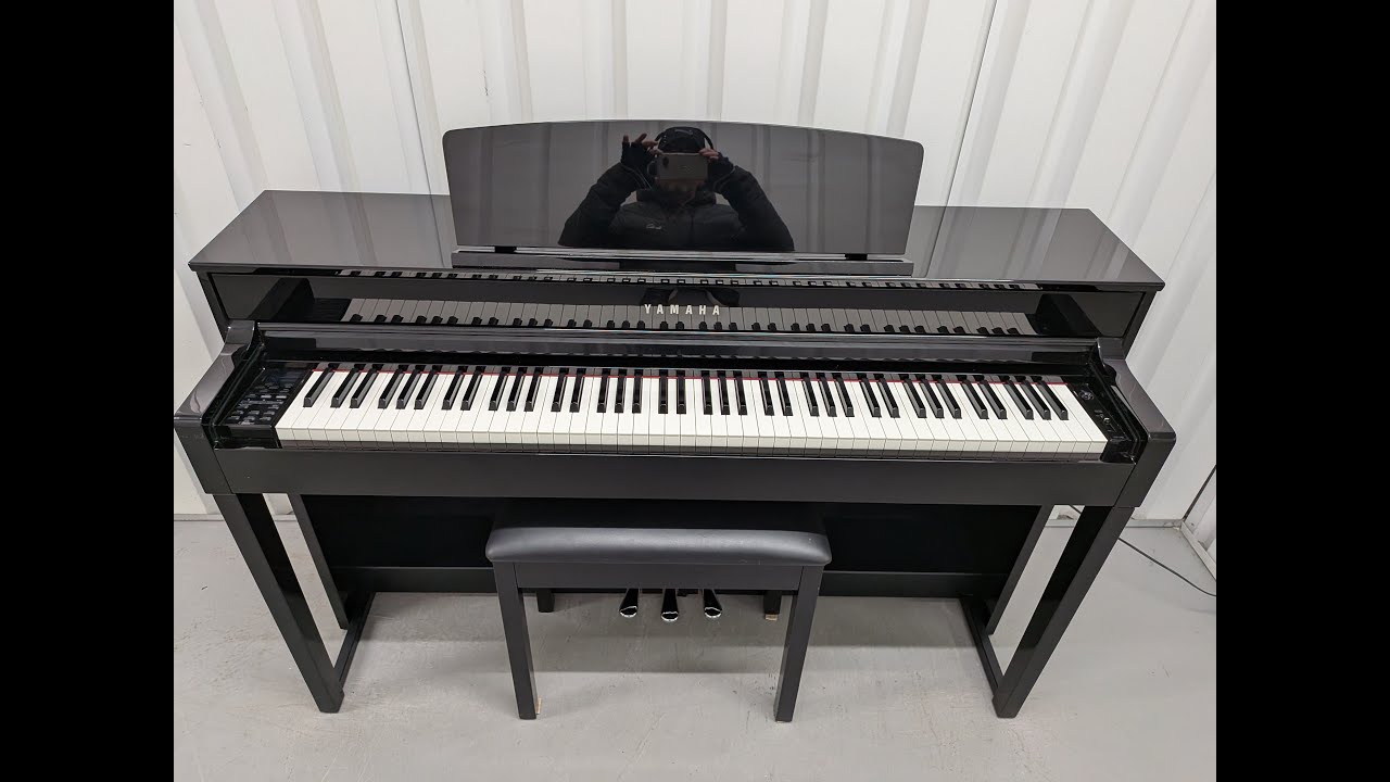 Yamaha Clavinova CLP-545PE in Polished Ebony glossy black. stock 