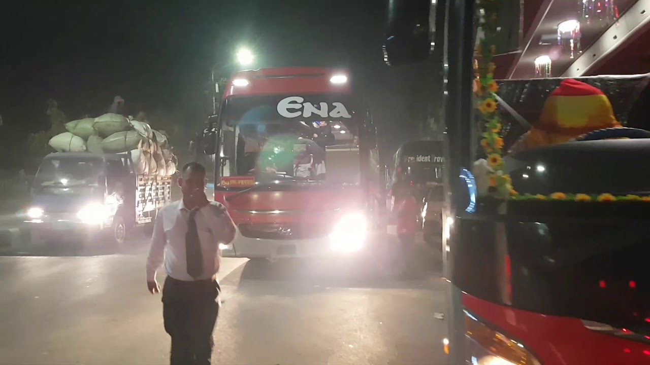 Night view of arambagh bus point... Greenline MAN, Shohagh Scania, Shyamoli Hyundai and Scania, ENA.