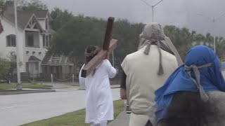 Cast of Easter Sunrise Passion Play carry cross to Cole Park as way to honor Christ