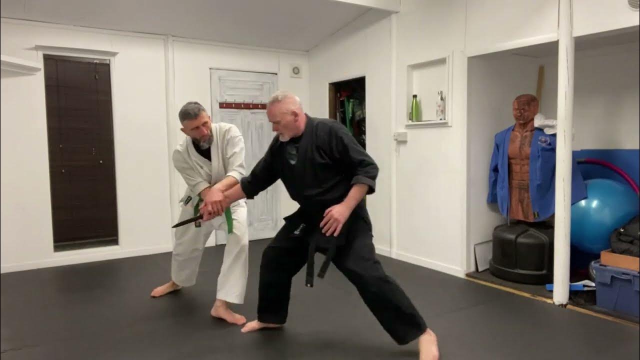 Wrist Throw from a Punch or Knife to the stomach JiuJitsu Yellow