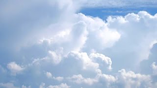 Mostly cloudy and breezy