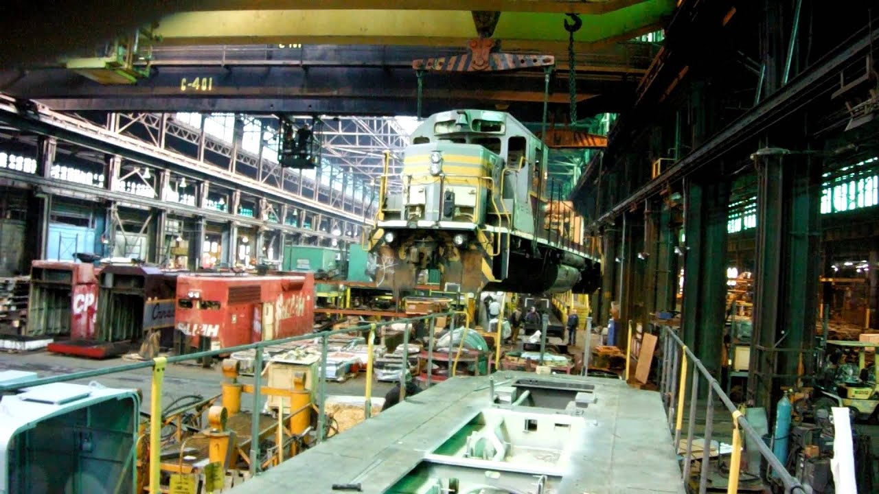 RAILROAD CP 3084 being air lifted AT NRE Silvis.