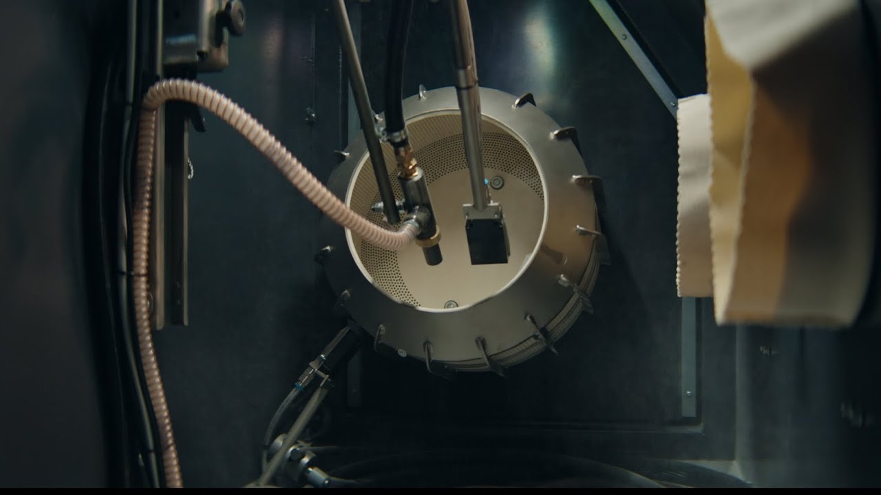 MHG Trommel-Strahlanlage mit integriertem Handarbeitsplatz