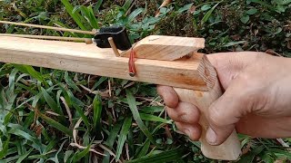 Create a unique wooden slingshot. and powerful, handsome